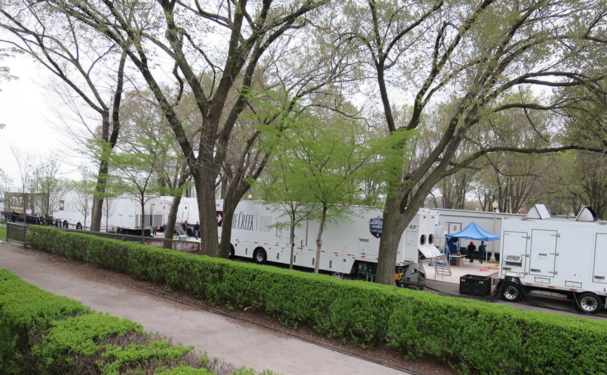 The NFL Media truck compound shown here is 6,000 feet away from the Auditorium Theatre, requiring extremely long fiber runs. 