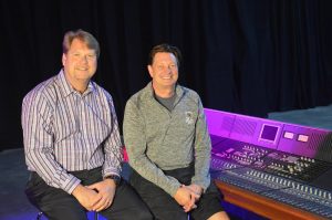 Kirt Hamm (left) and Fred Aldous with a Calrec console that was donated to CRAS by Game Creek Video. It will help train the next generation of audio mixers.